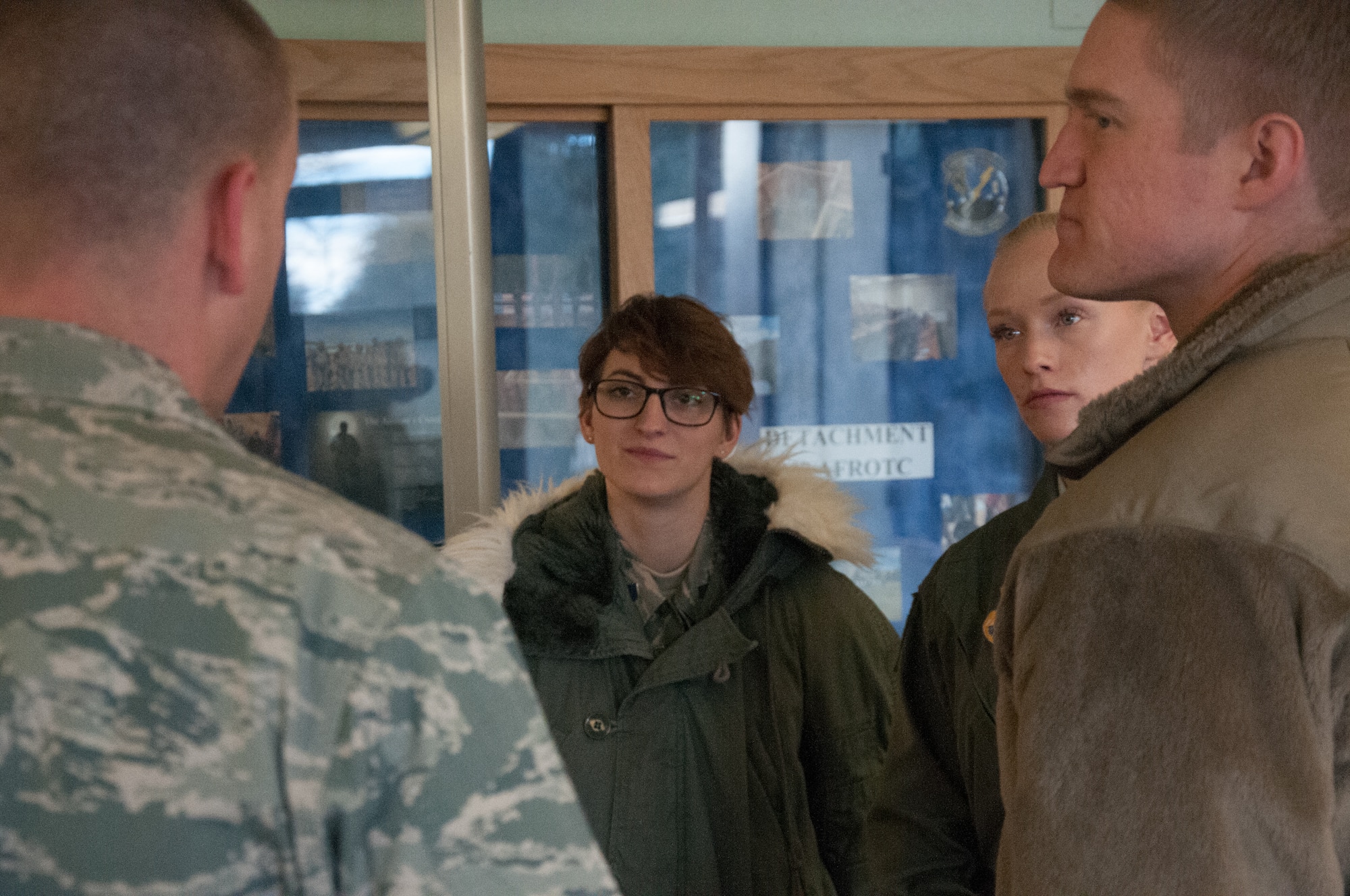 Cadet Leah Johnke explains cadet responsibilities at the detachment to Capt. Victoria Fort, 20th Air Force aide de camp, Capt. Jacob Waddy, 91st missile Group maintenance operations officer, and Maj. Nicholas Gydesen, 20th Air Force executive officer, at Air Force Reserve Officer Training Corps Detachment 940, at the University of Wyoming in Laramie, Wyo., Feb. 13 2019. Johnke is a senior studying at the University of Wyoming and is set to become a missile operator upon commissioning later this year.