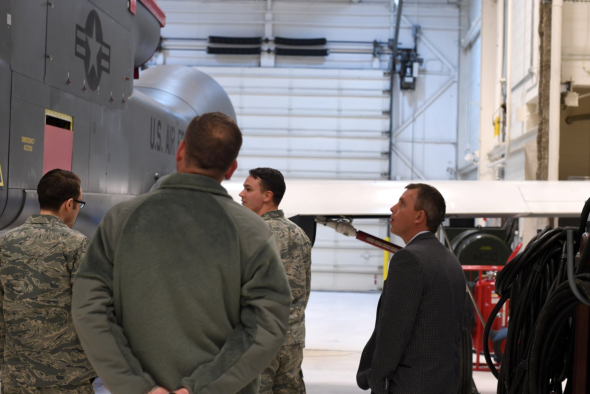 Congressman Kelly Armstrong learns more about the assembly of an RQ-4 Global Hawk aircraft, to include its Rolls Royce engine, February 21, 2019, on Grand Forks Air Force Base, North Dakota. Armstrong’s visit to Grand Forks AFB also included a trip to the 319th Communications Squadron’s High Frequency Global Communication System and the 348th Reconnaissance Squadron’s Global Hawk Operations Center, both of which are year-round 24-hour missions. (U.S. Air Force photo by Senior Airman Elora J. Martinez)