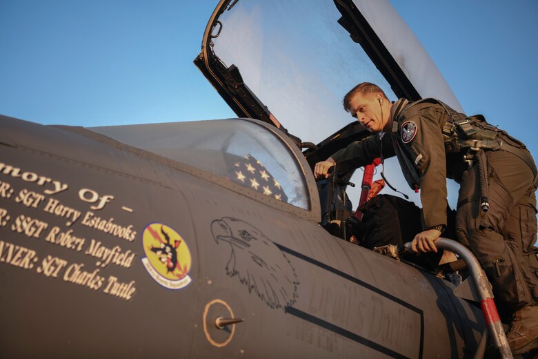 Royal Air Force Lakenheath 494th Fighter Squadron pilots prepare to participate in the MiAmigo 75th anniversary flyover, RAF Lakenheath, England, February 22, 2019. The eight Airmen will fly four F-15E Strike Eagles painted with the names of the men who sacrificed their lives at Endcliffe Park, England in 1944. (U.S. Air Force photo by Airman 1st Class Shanice Williams-Jones)