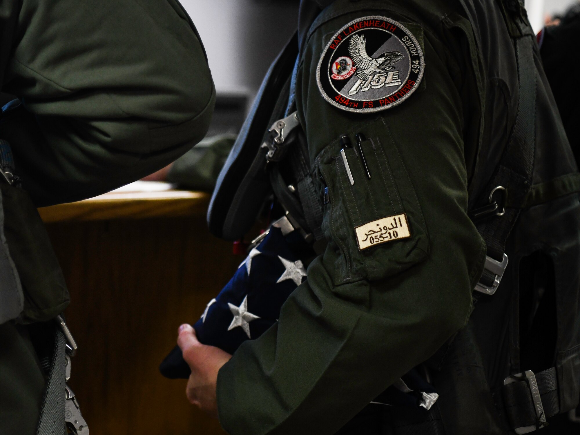 Royal Air Force Lakenheath 494th Fighter Squadron pilots prepare to participate in the MiAmigo 75th anniversary flyover, RAF Lakenheath, England, February 22, 2019. The eight Airmen will fly four F-15E Strike Eagles painted with the names of the men who sacrificed their lives at Endcliffe Park, England in 1944. (U.S. Air Force photo by Airman 1st Class Shanice Williams-Jones)