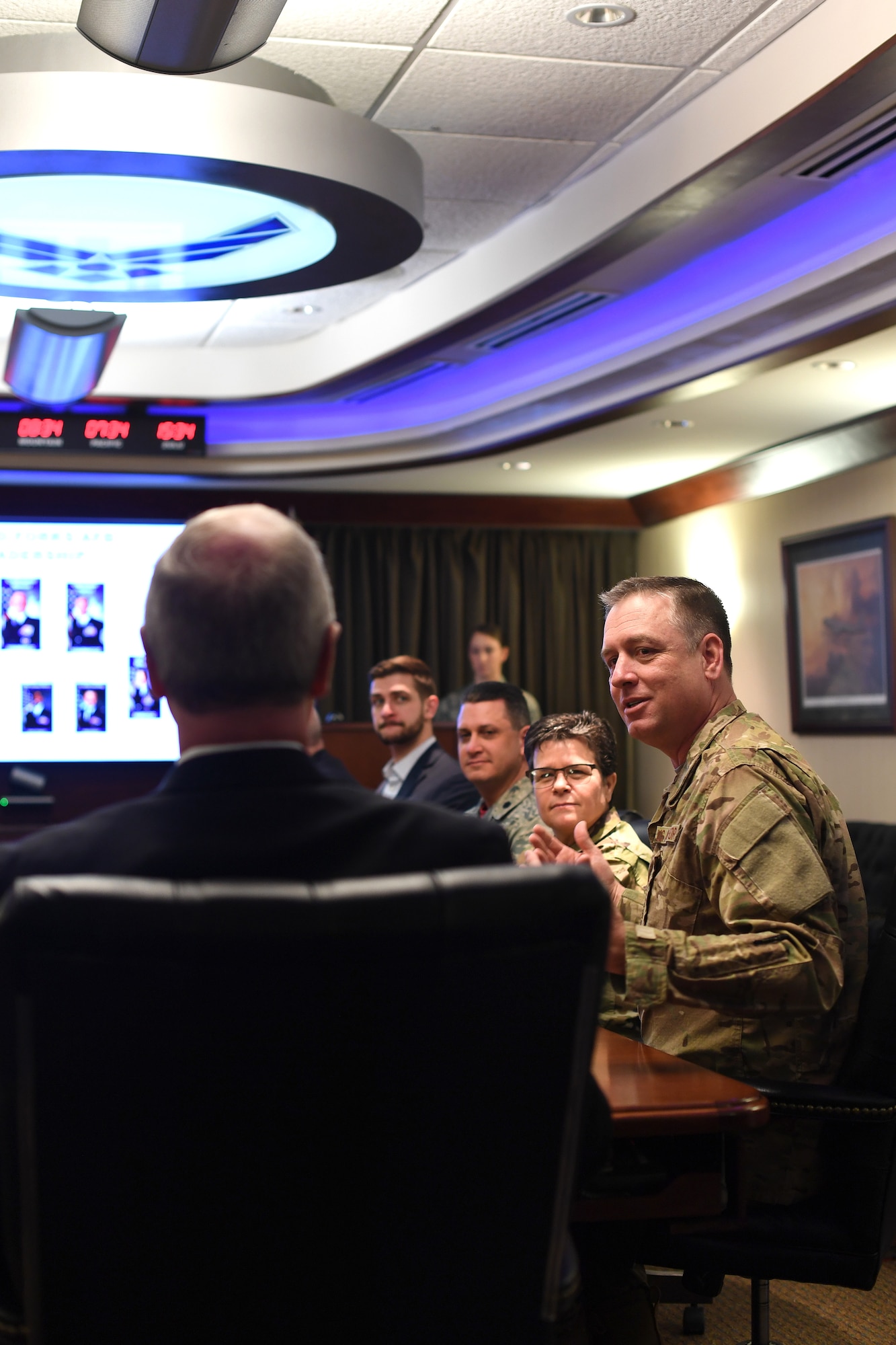 Col. Benjamin Spencer, 319th Air Base Wing commander, provides a mission in-brief to Senator Kevin Cramer February 22, 2019, on Grand Forks Air Force Base, North Dakota. The brief included current data about the base and its priorities to improve squadron readiness, build leaders and bring the future with innovation. (U.S. Air Force photo by Senior Airman Elora J. Martinez)