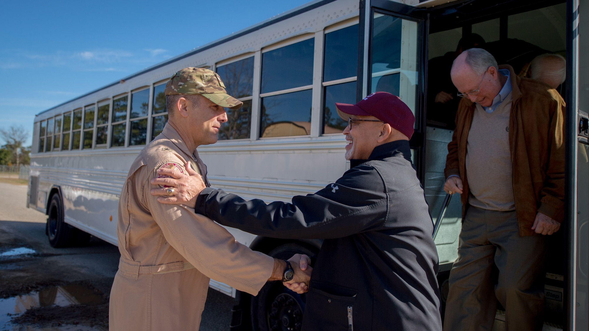 U.S. Air Force Brig. Gen. Matthew Isler, U.S. Air Forces Central Command assistant deputy commander, greets James McCain, Sumter City Council chairman, at Shaw Air Force Base, S.C., Jan. 25, 2019.