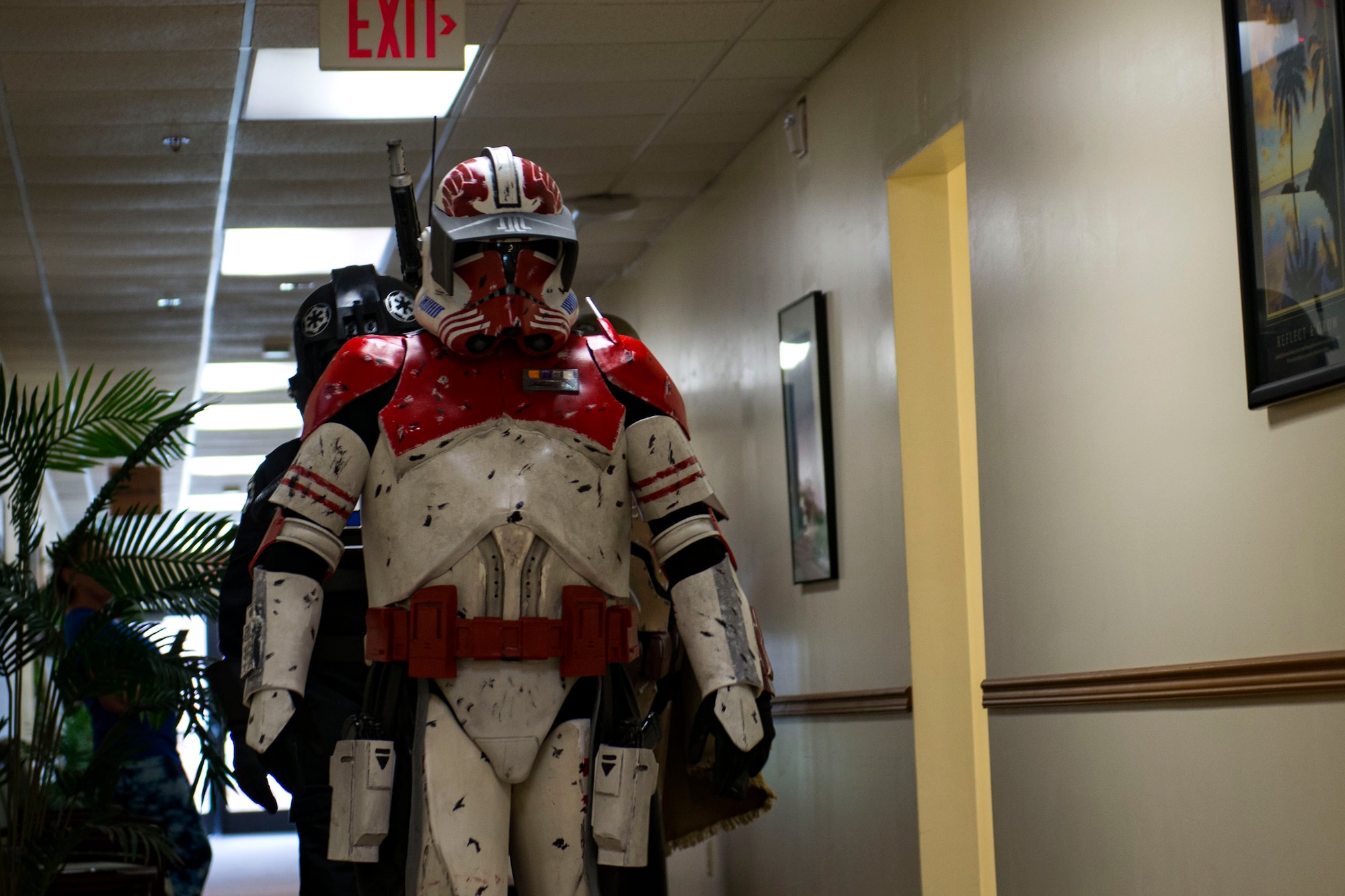 Cosplayers make their way to a photoshoot during Cub Con II, a multi-genre entertainment convention, Feb. 23, 2019, at Moody Air Force Base, Ga. At the convention, guests were able to participate in board and card games, a video game tournament and a “Star Wars” panel. The event served as an opportunity to give Team Moody a chance to experience the anime and comic book culture. (U.S. Air Force photo by Airman 1st Class Erick Requadt)
