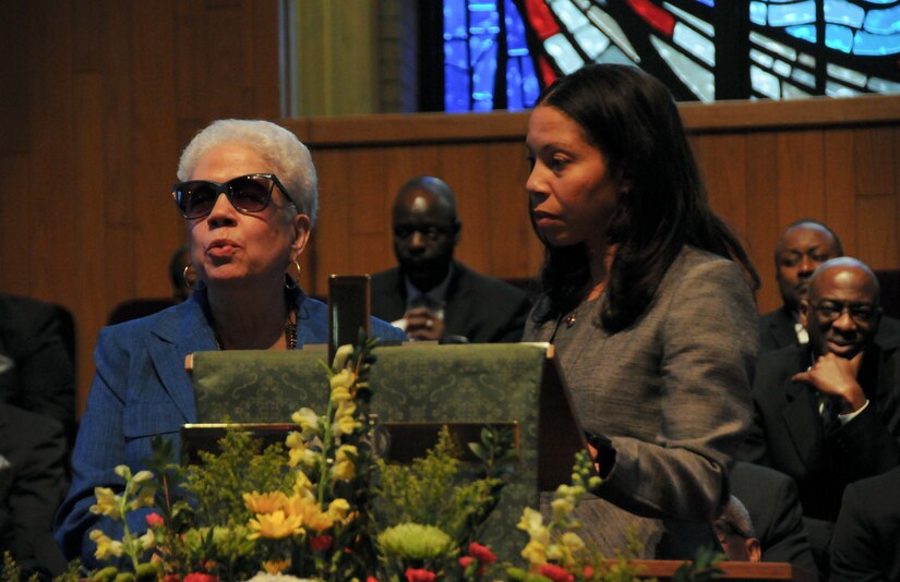 Marla L. Andrews (left), daughter of U.S. Army Air Forces Capt. Lawrence E. Dickson, delivers remarks during a Feb. 24 ceremony held at Fountain Baptist Church in Summit, New Jersey, to recognize her father’s military service. Dickson was a Tuskegee Airman declared missing in action after his plane crashed in Europe in December 1944. Dickson’s remains were identified in November 2018 using the latest DNA tests, making him the first to be identified out of more than two-dozen Tuskegee Airmen declared MIA during World War II.