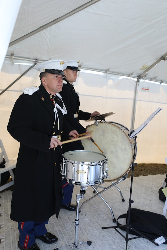 On Feb. 26, 2019, the U.S. Marine Band participated in the National Desert Storm and Desert Shield Memorial site dedication ceremony, located on the National Mall. Speakers included the former Vice President of the United States, Dick Cheney; Scott Stump, President and CEO of National Desert Storm War Memorial Association; Congressman Phil Roe, M.D. (R-Tenn.), Lieutenant Governor Jenean Hampton (R-Ky.), General Charles Albert “Chuck” Horner, USAF, (ret.); The Honorable Edward “Skip” Gnehm, Ambassador of the United States of America to Kuwait (1991); His Excellency Abdullah Al-Jaber Al-Sabah, the Ambassador of the State of Kuwait. (U.S. Marine Corps photo by Master Sgt. Amanda Simmons/released) More info about the site: http://www.ndswm.org/