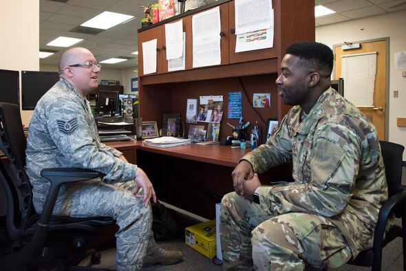 Tech. Sgt. Johsua Nix, 47th Force Support Suqadron NCO in charge of career development, discusses career opportunities with Staff Sgt. Thaddeus Tyson, 47th FSS force management specialist, at Laughlin Air Force Base, Texas, Feb 26. 2019. Nix was chosen by wing leadership to be the “XLer” of the week, for the week of Feb. 18, 2019, at Laughlin Air Force Base, Texas. (U.S. Air Force photo by Senior Airman John A. Crawford)