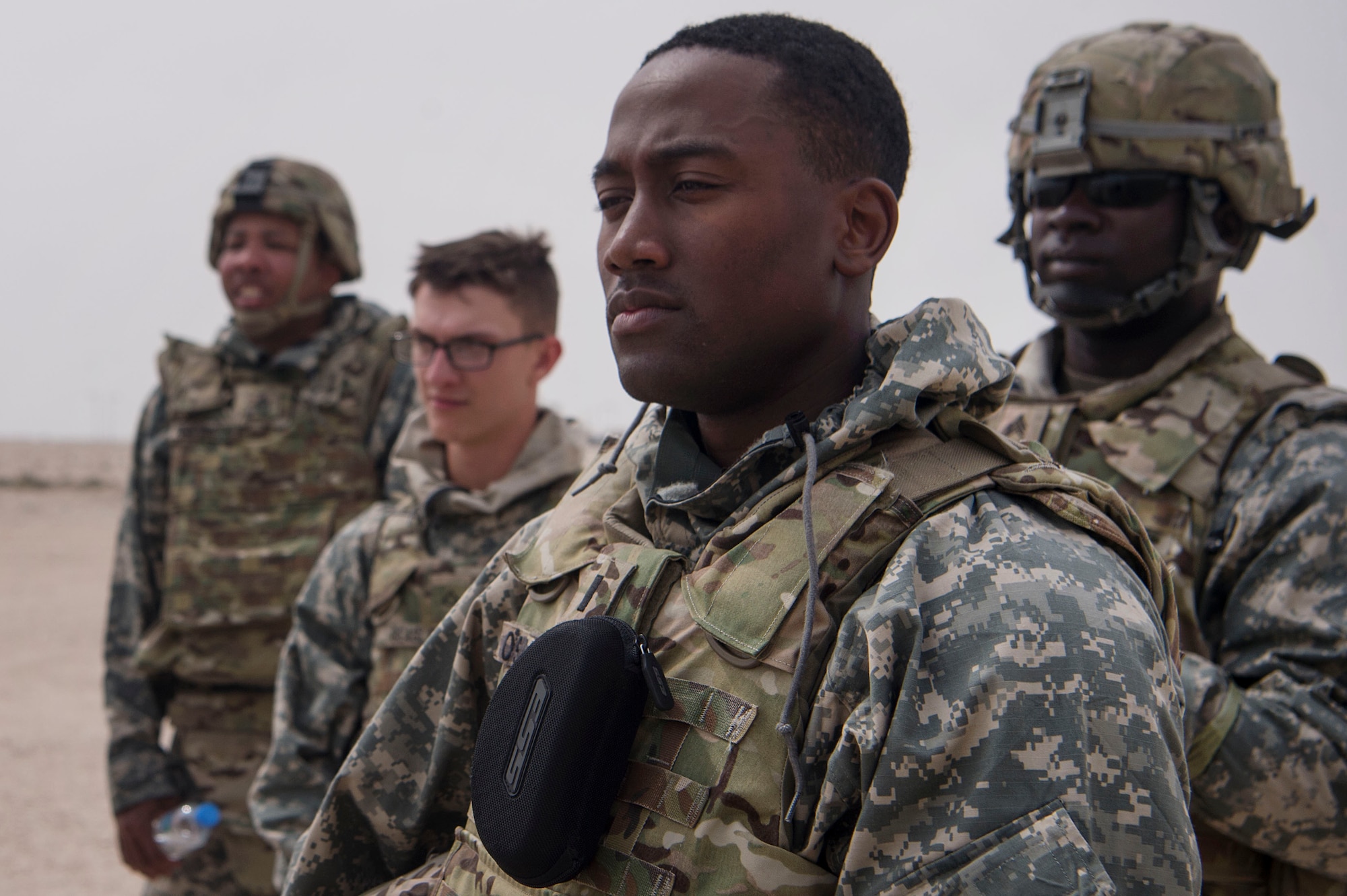 U.S. Army Soldiers of the 1st Battalion, 43rd Air Defense Artillery (ADA) regiment, 11th ADA Brigade, observe Chemical, Biological, Radiological, Nuclear, and high yield explosives (CBRNE) decontamination techniques during a ground survey as part of a joint decontamination exercise Feb. 22, 2019, at Al Udeid Air Base, Qatar. U.S. Air Force and Army participants from the 379th Expeditionary Civil Engineer Squadron and the 1-43rd ADA, shared CBRNE best practices, and tested their response proficiency during the training. The event was the conclusion of a four phase training curriculum. (U.S. Air Force photo by Tech. Sgt. Christopher Hubenthal)