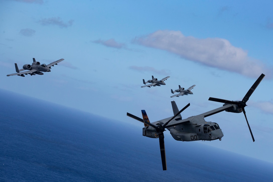 U.S. Air Force A-10 Thunderbolt II aircraft assigned to the 442nd Fighter Wing, Whiteman Air Force Base, Missouri, escort MV-22B Osprey assigned to Marine Medium Tiltrotor Squadron 268, Hawaii, Feb. 26, 2019. U.S. Marines with Weapons Company, 2nd Battalion, 3rd Marine Regiment and VMM-268 along with A-10 Thunderbolt II conducted training consisting of a simulated tactical recovery of aircraft personnel scenario and a combat search and rescue scenario.