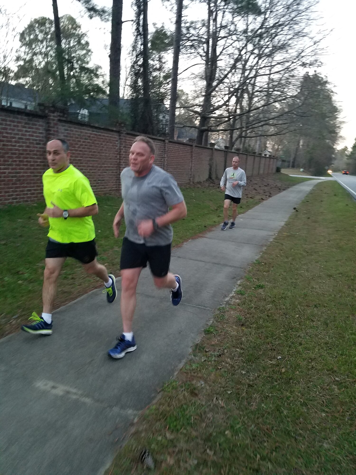 The Red White and Blue running group members race on their four-mile run in Sumter, S.C., Feb. 25, 2019.