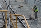 Thomas DeRosier, 733rd Logistics Readiness Squadron, Transportation section, utility rail branch locomotive engineer, operates a switch on a rail line at Joint Base Langley-Eustis, Virginia, Feb. 15, 2019. The U.S. Army closed the military occupation specialty to active duty and now only has Army Reserve and civilian railway operations crewmembers. (U.S. Air Force photo by Senior Airman Derek Seifert)