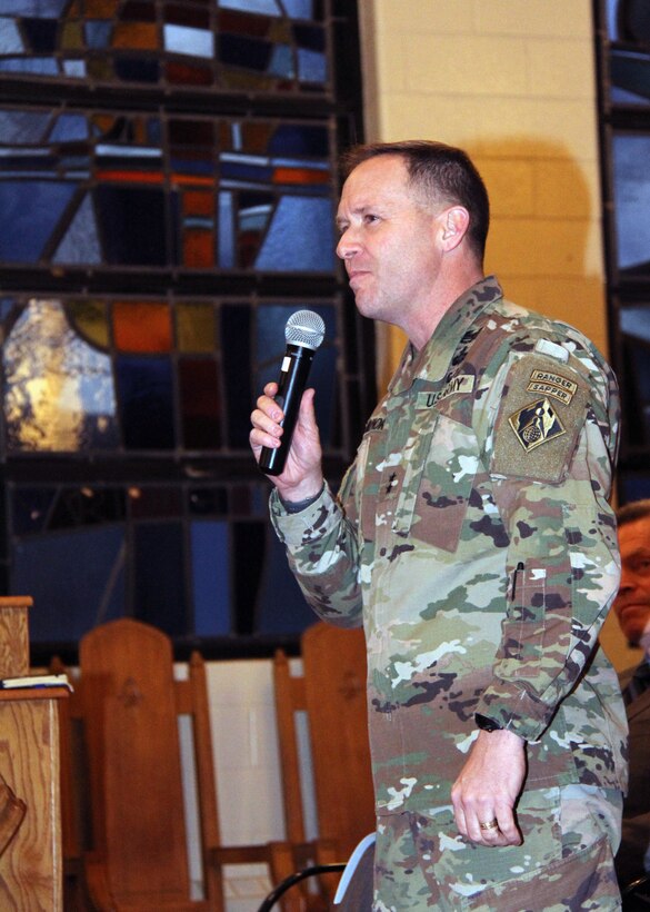 Maj. Gen. Jeffrey Milhorn speaks to Fort Hamilton residents on Feb. 26.