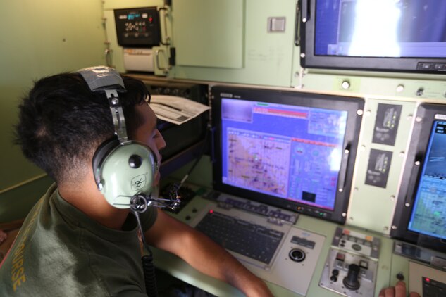 Cpl. Freddy D. Calderon, an unmanned aircraft systems operators with Marine Unmanned Aerial Vehicle Squadron 4, 4th Marine Aircraft Wing, Marine Forces Reserve, sets the flight path for an RQ-7 Shadow to perform reconnaissance at Camp Wilson, Marine Air Ground Combat Center, 29 Palms, California, June 22, 2017 during Integrated Training Exercise 4-17. The Marines conducted reconnaissance missions in support of the 2nd Battalion, 25th Marine Regiment, 4th Marine Division, MARFORRES, final battalion exercise of ITX 4-17. (U.S. Marine Corps photo by Lance Cpl. Stanley Moy)
