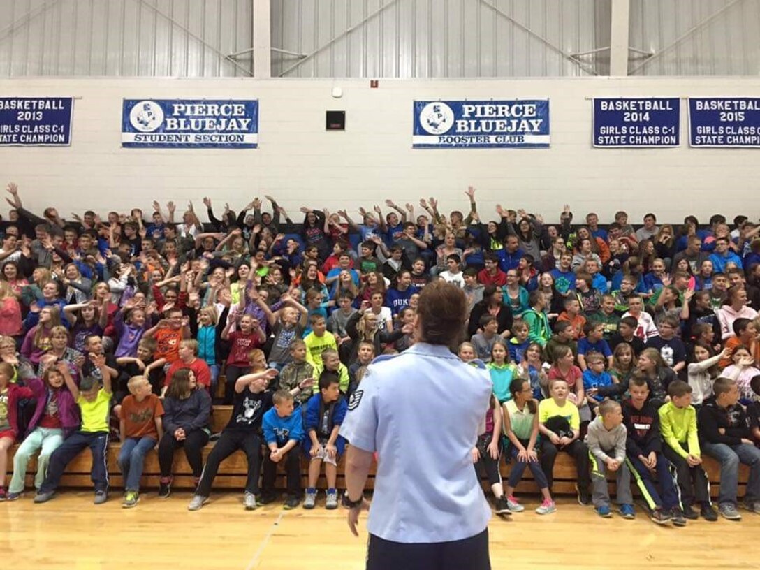 Vocalist performs for school students