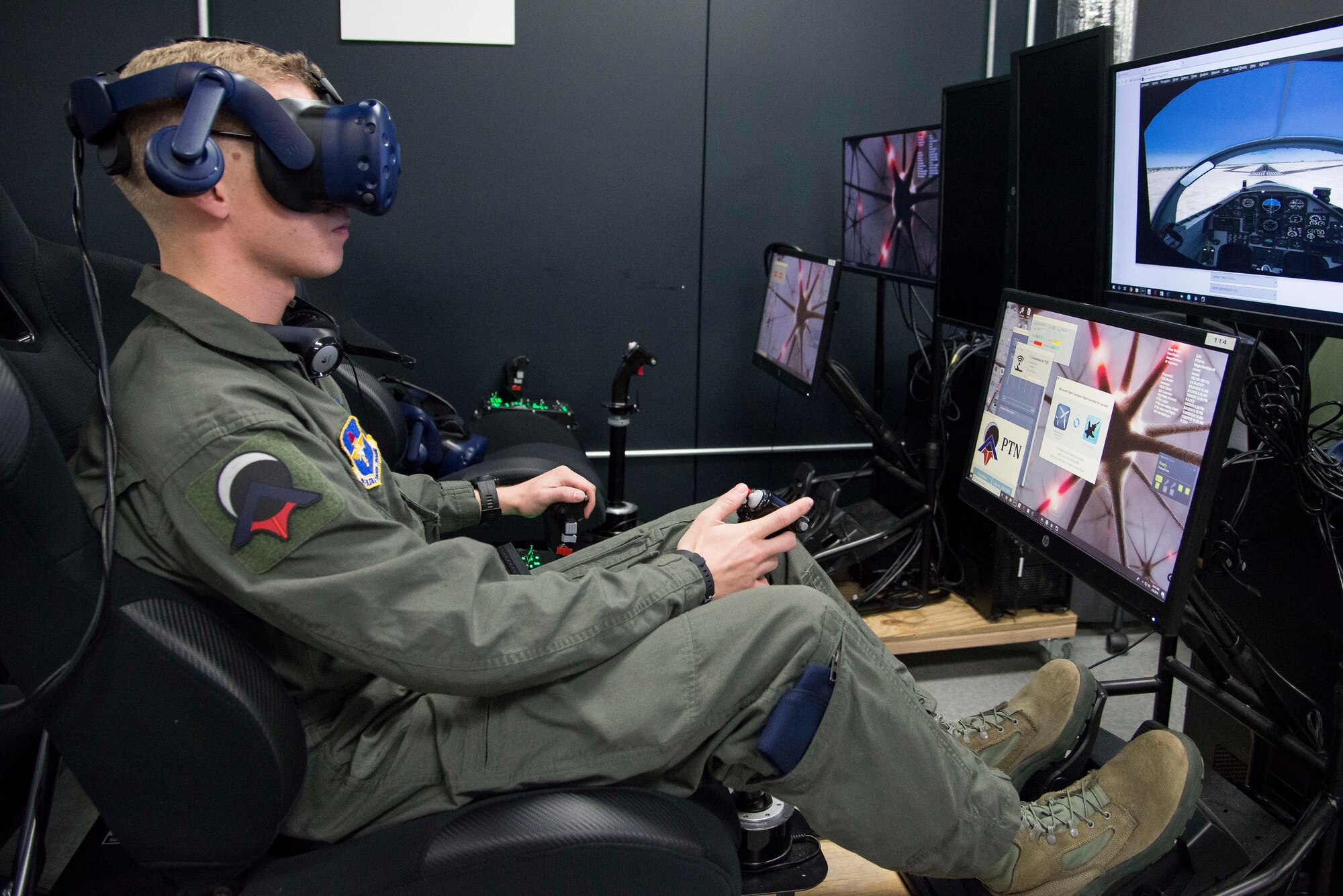 Airman First Class Shane Stewart, Pilot Training Next student, trains on a virtual reality flight simulator at the Armed Forces Reserve Center in Austin, Texas, Feb. 5, 2019. The instruction in this second version is shaped from the success of and lessons learned from the first PTN program, where 13 officers graduated in June 2018 and progressed to advanced training across multiple platforms. (U.S. Air Force photo by Sean M. Worrell)