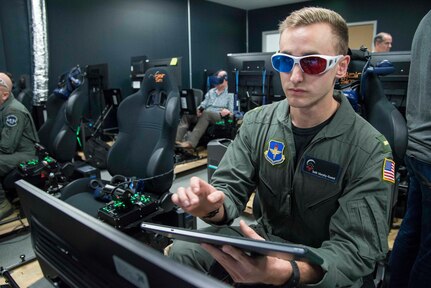 2nd Lt. Seth Murphy-Sweet, Pilot Training Next student, takes a 3D vision test prior to virtual reality flying training at Austin-Bergstrom International Airport in Austin, Texas, Feb. 5, 2019. Like the first version of PTN, the second iteration is working in a strong collaboration with AFWERX’s Austin hub at the Capital Factory, gaining conduits into industry that help the PTN team work solutions to issues they encounter as they develop the program. (U.S. Air Force photo by Sean M. Worrell)