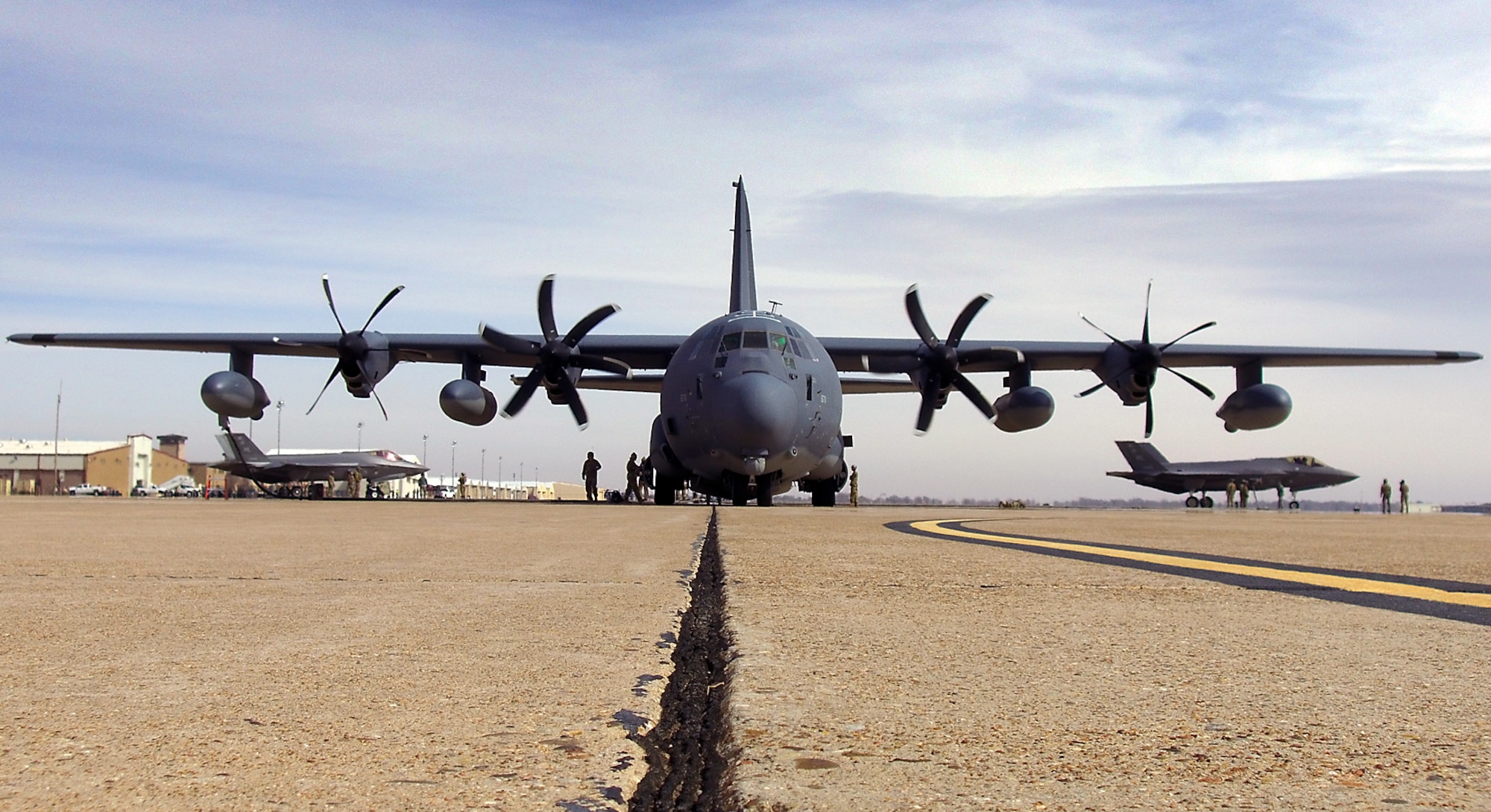 An MC-130J from the 9th Special Operations Squadron refuels two F-35A Lightning IIs from the 388th Fighter Wing at Cannon Air Force Base, N.M., during a Forward Air Refueling Point training exercise Feb. 27. This is the first time refueling operations between an MC-130J and an F-35 have been practiced. (U.S. Air Force photo by Micah Garbarino)