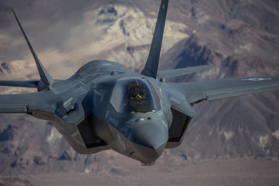 MARINE CORPS AIR STATION MIRAMAR, Calif.- An F-35B Lightning II assigned to Marine Fighter Attack Squadron (VMFA) 211, Marine Aircraft Group (MAG) 13, 3rd Marine Aircraft Wing (MAW), refuels in flight with Marine Aerial Refueler Transport Squadron (VMGR) 352 while conducting flight operations above Marine Corps Air Ground Combat Center Twentynine Palms, Calif., Oct. 4. The ability to refuel in flight is critical for the supportability and the sustainability of the F-35B during missions. (U.S. Marine Corps photo by Lance Cpl. Becky Calhoun/Released)