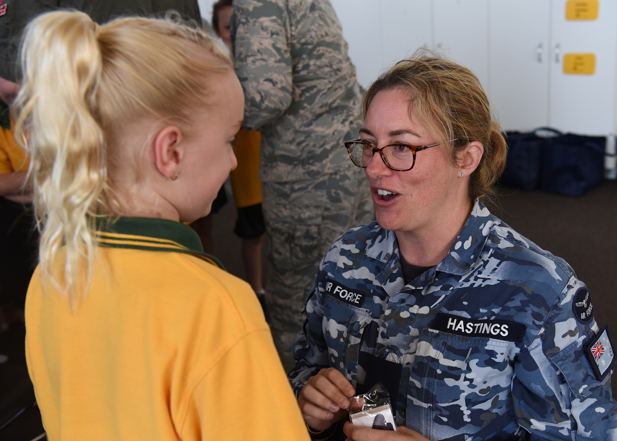 Royal Australian Air Force Flying Officer Claire Hastings, assigned to No. 28 Squadron, Her Majesty's Australian Ship Harman, Canberra, Australia, talks to Lara Primary School students in Geelong, Victoria, Australia, Feb. 26, 2019.
