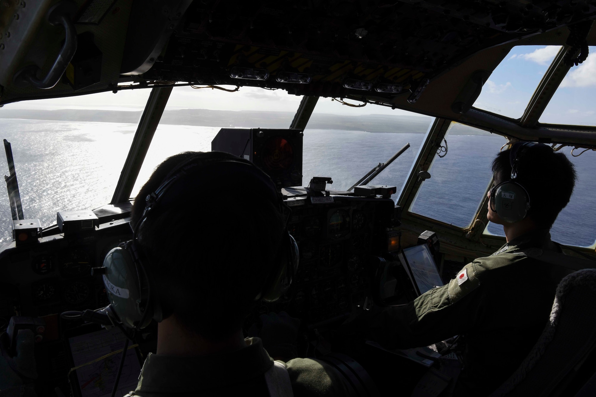 Service members with the Japan Air Self-Defense Force stationed out of the 401st Squadron at Komaki Air Base, Aichi Prefecture, Japan, fly to the island of Tinian for an exercise during Cope North 2019 Feb. 27, 2019. Service members from the U.S., Royal Australian Air Force, and the Japan Air Self-Defense Force exercised their Humanitarian Assistance and Disaster Relief skills together on Tinian by providing emergency medical care and secure transportation for simulated patients. (U.S. Air Force photo by Tech. Sgt. Jake Barreiro)