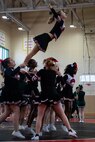 DoDEA cheerleaders soar with spirit and cheer