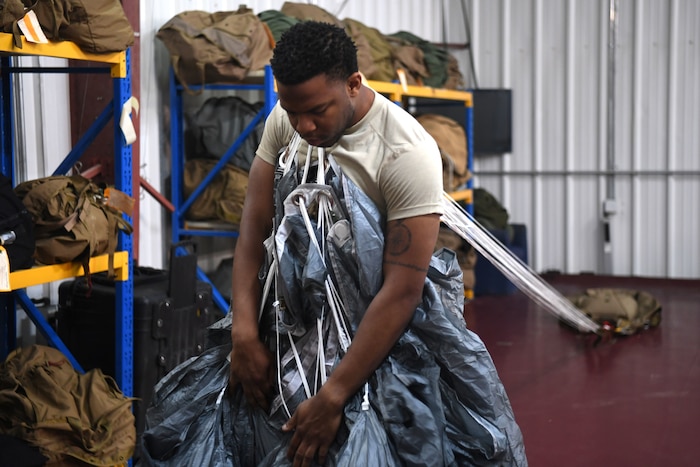 The 82nd Expeditionary Rescue Squadron aircrew flight equipment flight maintains parachutes for operations in East Africa. (Last names withheld for security purposes.)