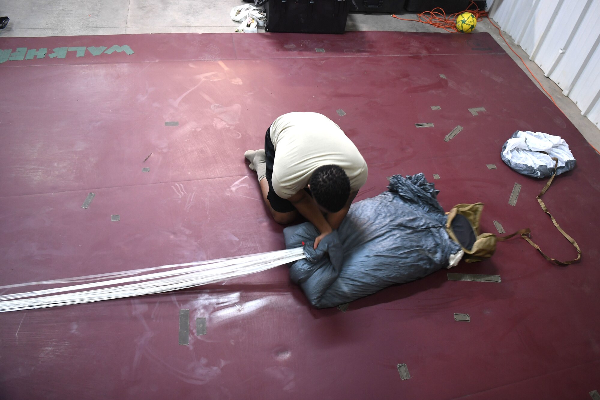 The 82nd Expeditionary Rescue Squadron aircrew flight equipment flight maintains parachutes for operations in East Africa. (Last names withheld for security purposes.)