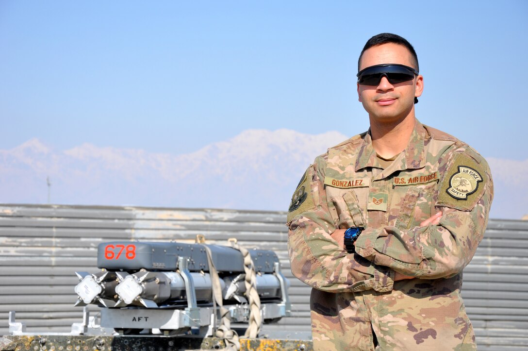 Staff Sgt. Tomas Gonzalez, 455th Air Expeditionary Wing weapons safety manager, stands in the flightline munitions holding area at Bagram Airfield, Afghanistan, Feb. 22, 2019.