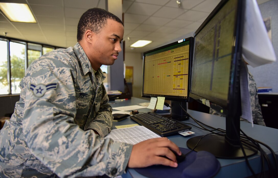 Airman 1st Class Kye Moffett, 434th Flying Training Squadron aviation resource manager, combs through the daily flight schedule at Laughlin Air Force Base, Texas, Feb. 27, 2019. Moffett, a member of Laughlin’s “1Charlies,” or aviation resource managers, played a hand in the unit winning the 2018 Sgt. Dee Campbell Outstanding Small Unit Award, one of their many decorations. (U.S. Air Force photo by Senior Airman Benjamin N. Valmoja)