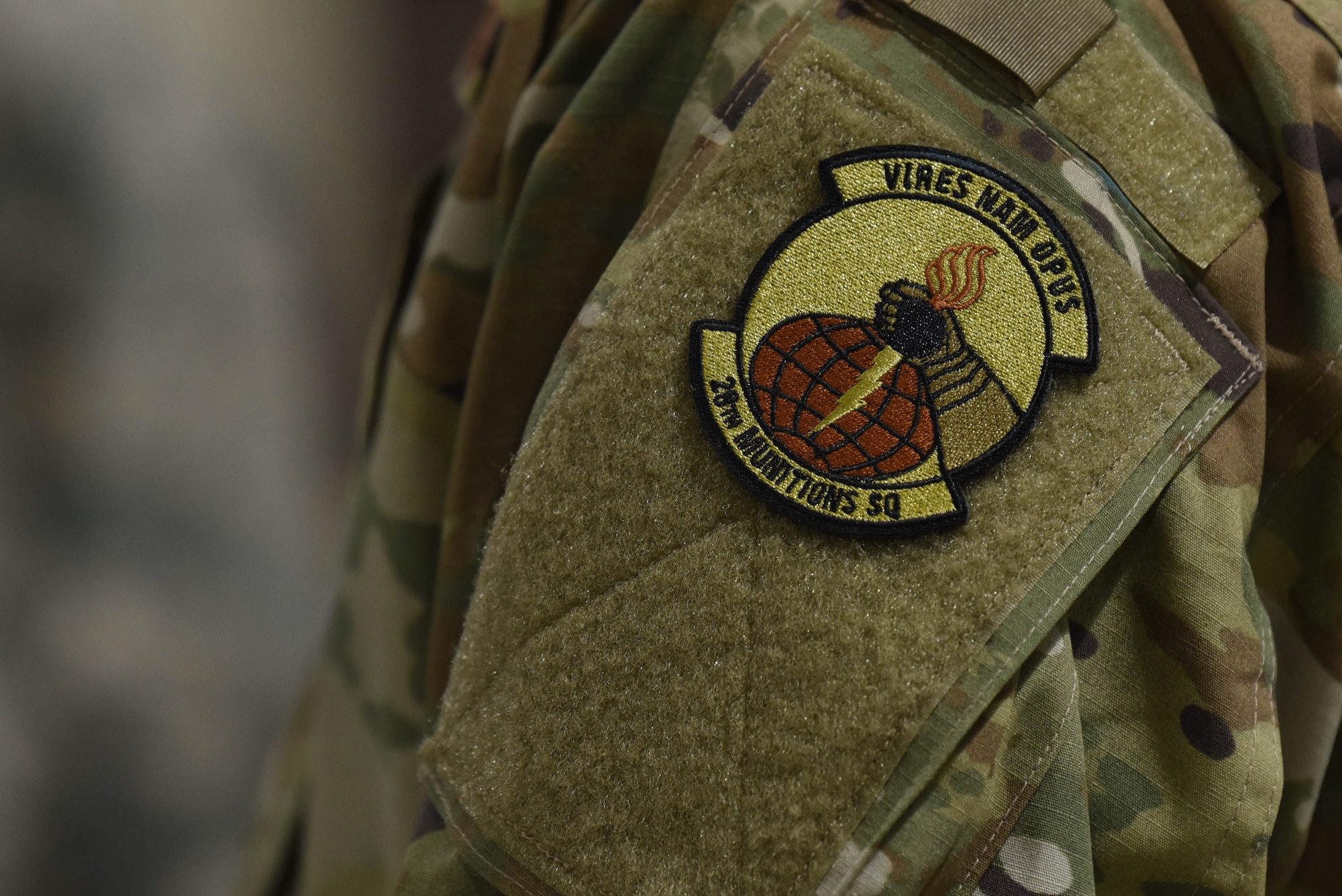 The patch of the 28th Munitions Squadron is proudly worn by a Raider Airman during a qualifying round for the second annual Air Force Combat Operations Competition on Ellsworth Air Force Base, S.D., Feb. 5, 2019. The competition is Air Force-wide and is used to determine the best of the best in munitions operations. (U.S. Air Force photo by Airman John Ennis)
