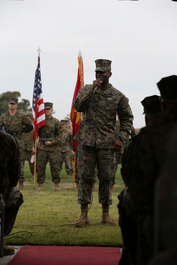 Sgt. Maj. Delwin K. Ellington, former Marine Wing Headquarters Squadron (MWHS) 3 sergeant major, speaks to the crowd during his relief ceremony at Marine Corps Air Station Miramar, Calif., Feb. 26. Ellington completed a three-year tour with his 3rd MAW family and is slated to assume the post as sergeant major of Special Purpose Marine Air Ground Task Force-Crisis Response-Central Command (SPMAGTF-CR-CC) 19.2 and deploy to Ahmad al-Jaber Air Base, Kuwait, late spring. (U.S. Marine Corps photo by Cpl. Joshua S. McAlpine)