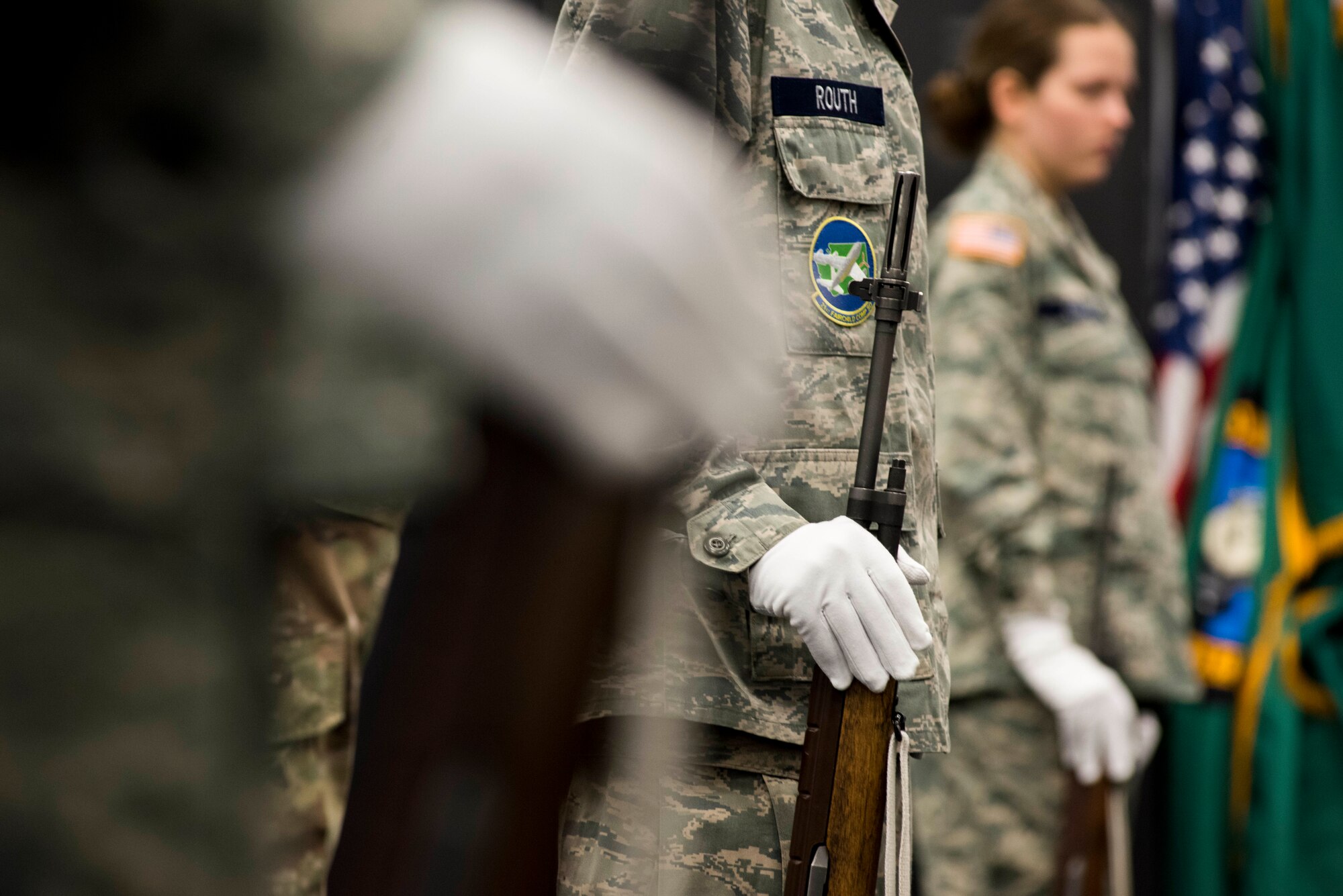 Cadets from the Civil Air Patrol 21st Fairchild Composite Squadron receive instruction on rifle procedures performed by 92nd Air Refueling Wing honor guardsmen at Fairchild Air Force Base, Washington, Feb. 26, 2019. The Civil Air Patrol 21st Fairchild Composite Squadron, consisting of cadets between the ages of 14 and 50 years old, received training from the 92nd ARW base honor guard on colors, flags and rifles. (U.S. Air Force photo by Airman 1st Class Lawrence Sena)