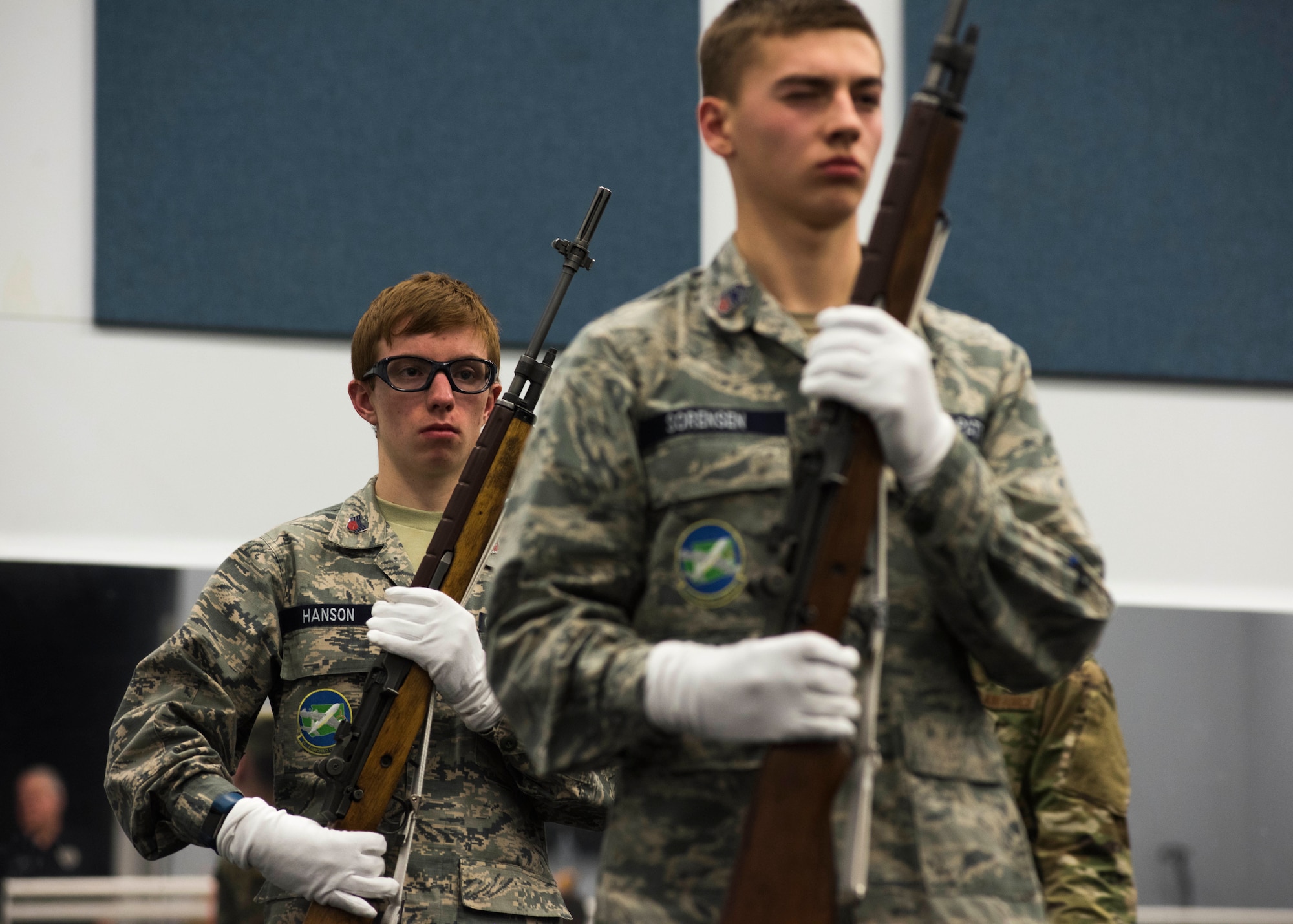 Civil Air Patrol Cadets Skylar Hanson and Caleb Sorenson, 21st Fairchild Composite Squadron, practice basic rifle movements performed by honor guardsmen at Fairchild Air Force Base, Washington, Feb. 26, 2019. As a total force partner of the Air Force, CAP assists with search and rescue, disaster relief and volunteering throughout the community. (U.S. Air Force photo by Airman 1st Class Lawrence Sena)