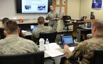 Senior Master Sgt. Susan Scapperotti, an Air Force Recruiting School instructor, teaches the first Total Force class at Joint Base San Antonio-Lackland.