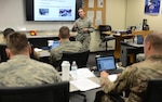 Senior Master Sgt. Susan Scapperotti, an Air Force Recruiting School instructor, teaches the first Total Force class at Joint Base San Antonio-Lackland.