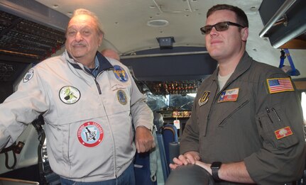 Tech. Sgt. Kevin Meredith, 68th Airlift Squadron flight engineer, talks about his duties on the flight deck of the C-5M Super Galaxy Feb. 25, 2019, at Joint Base San Antonio-Lackland. The group of 33 visitors learned about the glass cockpit and avionics of the largest aircraft in the Air Force inventory.