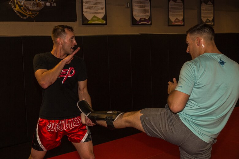 U.S. Marine Corps Sgt. Gianni Cappasso, an imagery analysis specialist assigned to Marine Fighter Attack Squadron 122, teaches Marines aboard Marine Corps Air Station (MCAS) Yuma Muy Thai techniques at the station gym on MCAS Yuma, Ariz., Feb. 13, 2019. Cappasso offers martial arts classes to Marines to provide them with the opportunity to use their spare time to become more deadly war-fighters and maintain a high level of physical fitness. (U.S. Marine Corps photo by Cpl. Isaac D. Martinez)