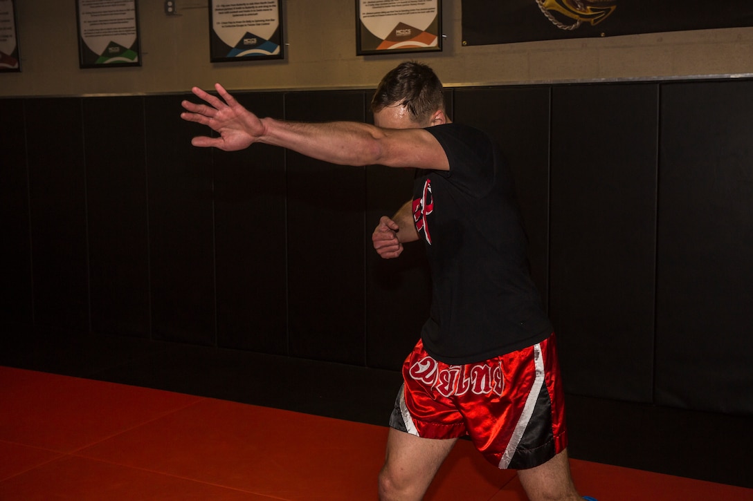 U.S. Marine Corps Sgt. Gianni Cappasso, an imagery analysis specialist assigned to Marine Fighter Attack Squadron 122, teaches Marines aboard Marine Corps Air Station (MCAS) Yuma Muy Thai techniques at the station gym on MCAS Yuma, Ariz., Feb. 13, 2019. Cappasso offers martial arts classes to Marines to provide them with the opportunity to use their spare time to become more deadly war-fighters and maintain a high level of physical fitness. (U.S. Marine Corps photo by Cpl. Isaac D. Martinez)