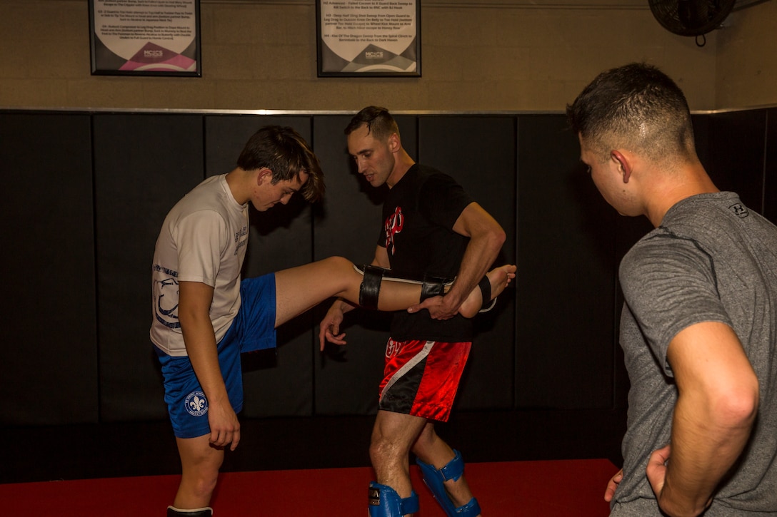 U.S. Marine Corps Sgt. Gianni Cappasso, an imagery analysis specialist assigned to Marine Fighter Attack Squadron 122, teaches Marines aboard Marine Corps Air Station (MCAS) Yuma Muy Thai techniques at the station gym on MCAS Yuma, Ariz., Feb. 13, 2019. Cappasso offers martial arts classes to Marines to provide them with the opportunity to use their spare time to become more deadly war-fighters and maintain a high level of physical fitness. (U.S. Marine Corps photo by Cpl. Isaac D. Martinez)
