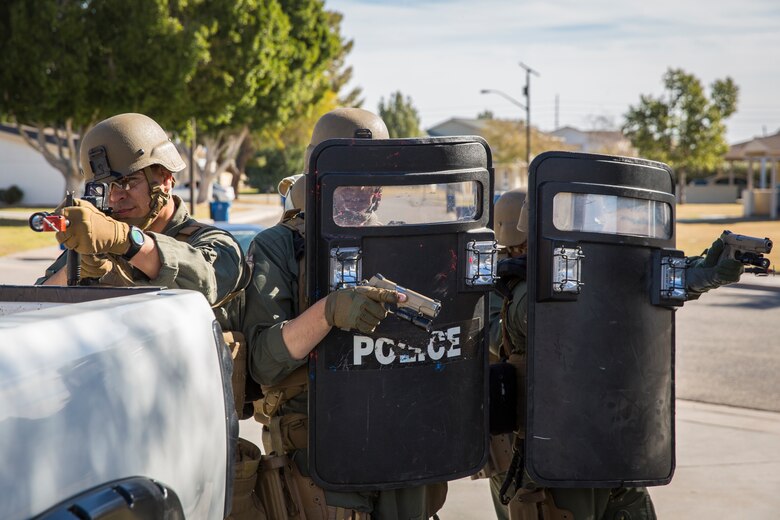 U.S. Marines with the Provost Marshal's Office (PMO), Headquarters and Headquarters Squadron (H&HS), Marine Corps Air Station (MCAS) Yuma, conduct Special Reaction Team (SRT) training on MCAS Yuma, Ariz., Feb. 25, 2019. The SRT is comprised of military police personnel trained to give an installation commander the ability to counter or contain a special threat situation surpassing normal law enforcement capabilities. (U.S. Marine Corps photo by Sgt. Allison Lotz)