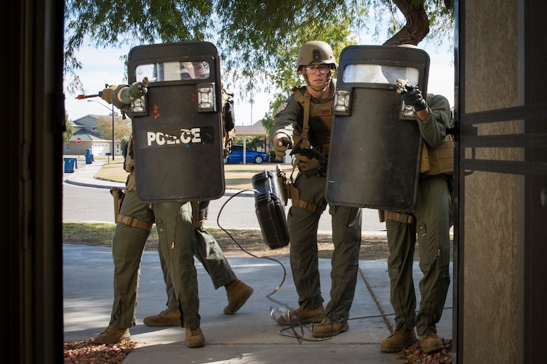 U.S. Marines with the Provost Marshal's Office (PMO), Headquarters and Headquarters Squadron (H&HS), Marine Corps Air Station (MCAS) Yuma, conduct Special Reaction Team (SRT) training on MCAS Yuma, Ariz., Feb. 25, 2019. The SRT is comprised of military police personnel trained to give an installation commander the ability to counter or contain a special threat situation surpassing normal law enforcement capabilities. (U.S. Marine Corps photo by Sgt. Allison Lotz)