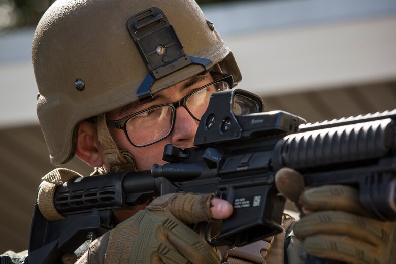 U.S. Marines with the Provost Marshal's Office (PMO), Headquarters and Headquarters Squadron (H&HS), Marine Corps Air Station (MCAS) Yuma, conduct Special Reaction Team (SRT) training on MCAS Yuma, Ariz., Feb. 25, 2019. The SRT is comprised of military police personnel trained to give an installation commander the ability to counter or contain a special threat situation surpassing normal law enforcement capabilities. (U.S. Marine Corps photo by Sgt. Allison Lotz)