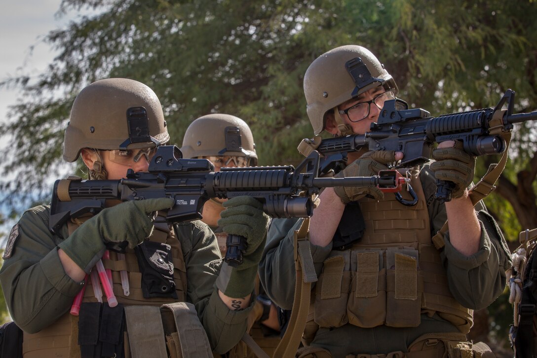 U.S. Marines with the Provost Marshal's Office (PMO), Headquarters and Headquarters Squadron (H&HS), Marine Corps Air Station (MCAS) Yuma, conduct Special Reaction Team (SRT) training on MCAS Yuma, Ariz., Feb. 25, 2019. The SRT is comprised of military police personnel trained to give an installation commander the ability to counter or contain a special threat situation surpassing normal law enforcement capabilities. (U.S. Marine Corps photo by Sgt. Allison Lotz)
