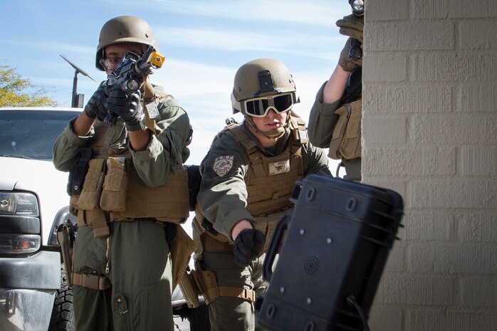 U.S. Marines with the Provost Marshal's Office (PMO), Headquarters and Headquarters Squadron (H&HS), Marine Corps Air Station (MCAS) Yuma, conduct Special Reaction Team (SRT) training on MCAS Yuma, Ariz., Feb. 25, 2019. The SRT is comprised of military police personnel trained to give an installation commander the ability to counter or contain a special threat situation surpassing normal law enforcement capabilities. (U.S. Marine Corps photo by Sgt. Allison Lotz)