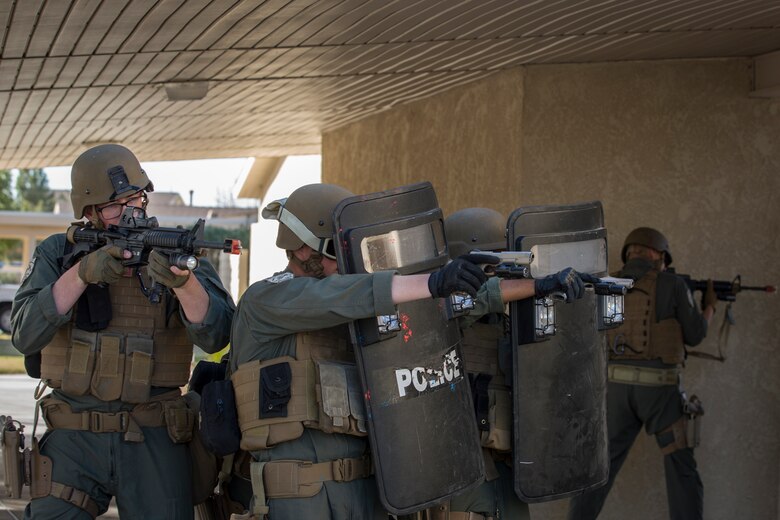 U.S. Marines with the Provost Marshal's Office (PMO), Headquarters and Headquarters Squadron (H&HS), Marine Corps Air Station (MCAS) Yuma, conduct Special Reaction Team (SRT) training on MCAS Yuma, Ariz., Feb. 25, 2019. The SRT is comprised of military police personnel trained to give an installation commander the ability to counter or contain a special threat situation surpassing normal law enforcement capabilities. (U.S. Marine Corps photo by Sgt. Allison Lotz)