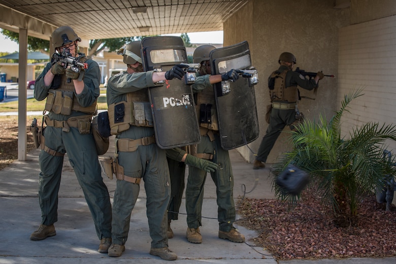 U.S. Marines with the Provost Marshal's Office (PMO), Headquarters and Headquarters Squadron (H&HS), Marine Corps Air Station (MCAS) Yuma, conduct Special Reaction Team (SRT) training on MCAS Yuma, Ariz., Feb. 25, 2019. The SRT is comprised of military police personnel trained to give an installation commander the ability to counter or contain a special threat situation surpassing normal law enforcement capabilities. (U.S. Marine Corps photo by Sgt. Allison Lotz)