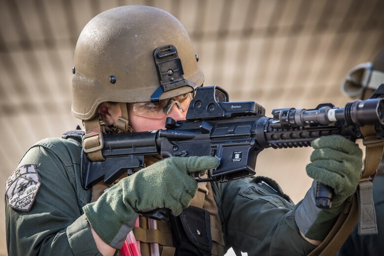 U.S. Marines with the Provost Marshal's Office (PMO), Headquarters and Headquarters Squadron (H&HS), Marine Corps Air Station (MCAS) Yuma, conduct Special Reaction Team (SRT) training on MCAS Yuma, Ariz., Feb. 25, 2019. The SRT is comprised of military police personnel trained to give an installation commander the ability to counter or contain a special threat situation surpassing normal law enforcement capabilities. (U.S. Marine Corps photo by Sgt. Allison Lotz)