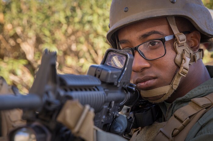 U.S. Marines with the Provost Marshal's Office (PMO), Headquarters and Headquarters Squadron (H&HS), Marine Corps Air Station (MCAS) Yuma, conduct Special Reaction Team (SRT) training on MCAS Yuma, Ariz., Feb. 25, 2019. The SRT is comprised of military police personnel trained to give an installation commander the ability to counter or contain a special threat situation surpassing normal law enforcement capabilities. (U.S. Marine Corps photo by Sgt. Allison Lotz)