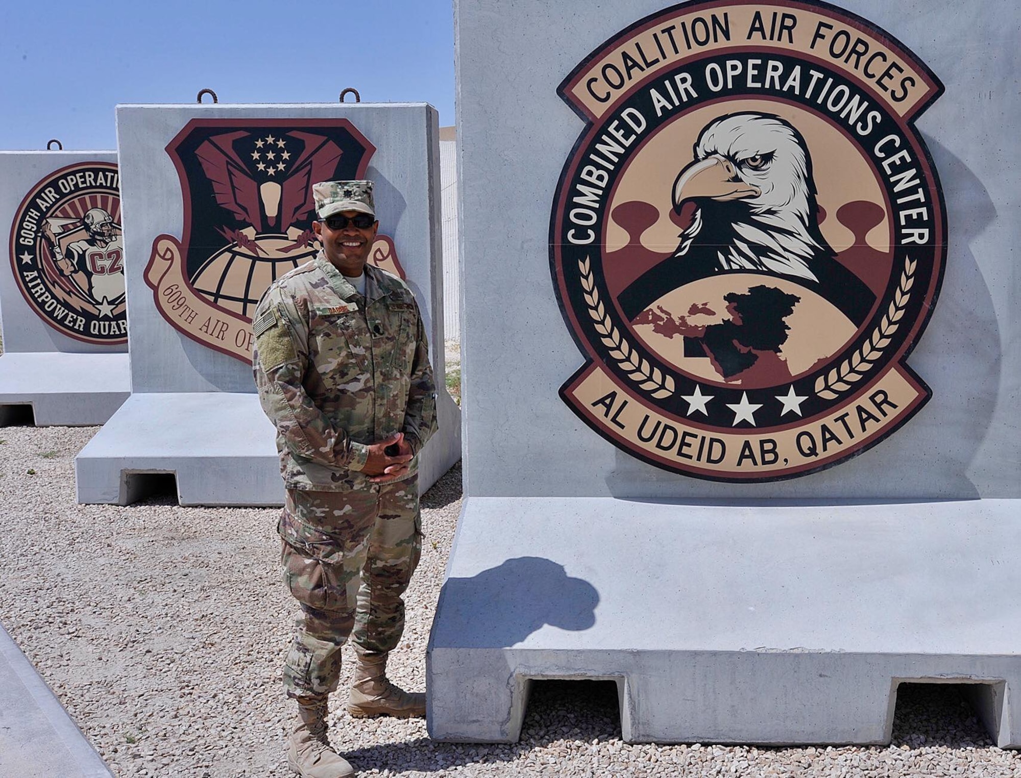 U.S. Air Force Chaplain Lt. Col. Steve Dabbs, the wing Chaplin of the 97th Air Mobility Wing, stands by the Chapels stained glass, Feb. 25, 2019, at Altus Air Force Base, Okla.