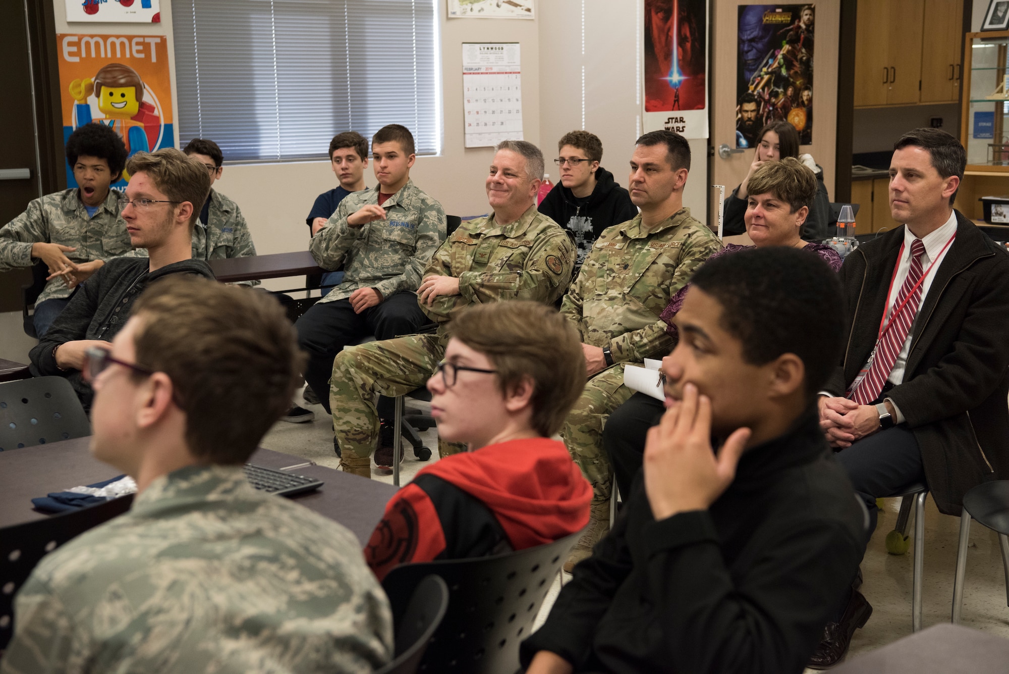 Col. Robert W. Trayers Jr., Air Force Recruiting Service vice commander, and Lt. Col. Steven Lamb, 502nd Installation Support Group vice commander, receive a presentation Feb. 13, 2019, about the science, technology, engineering and mathematics (STEM) programs at Virginia Allred Stacey Junior/Senior High School at Joint Base San Antonio-Lackland, Texas.
