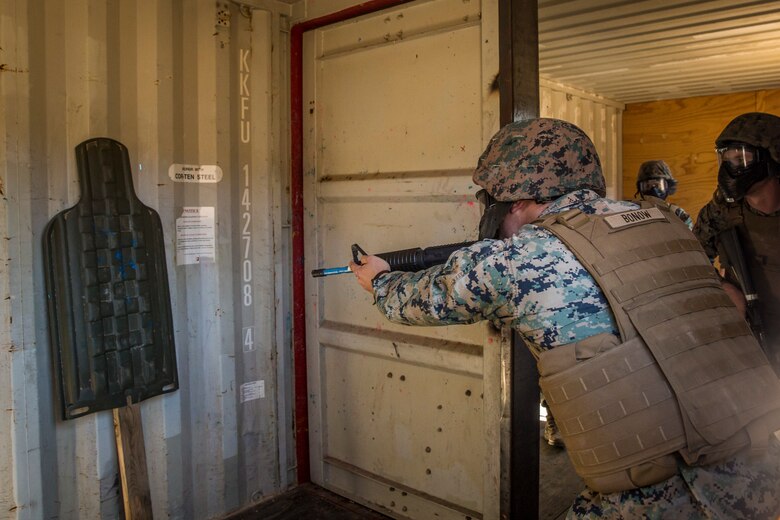 U.S. Marines and Sailors assigned to Marine Corps Air Station (MCAS) Yuma's Search and Rescue (SAR) unit talk about the SAR unit's mission to non-commisioned officers (NCOs) from MCAS Yuma, Ariz., Feb. 7, 2019 as a part of "Operation Backbone." Operation Backbone is a quarterly unit exercise meant to strengthen the warrior's spirit in the non-commisioned officers (NCOs) and promote cohesion between them. The exercise consisted of a hike with the Headquarters and Headquarters Squadron (H&HS)  commanding officer and acting sergeant major, several classes, and a warriors night. Classes included simulated room clearing training, terrain model training, improvised explosive devices (IED) training, and the Family Advocacy Program on station sent out a representative to talk to the NCOs about leadership. (U.S. Marine Corps photo by Cpl. Isaac D. Martinez)